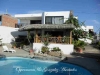 Pool home with 2 rental units for sale in Manta.
